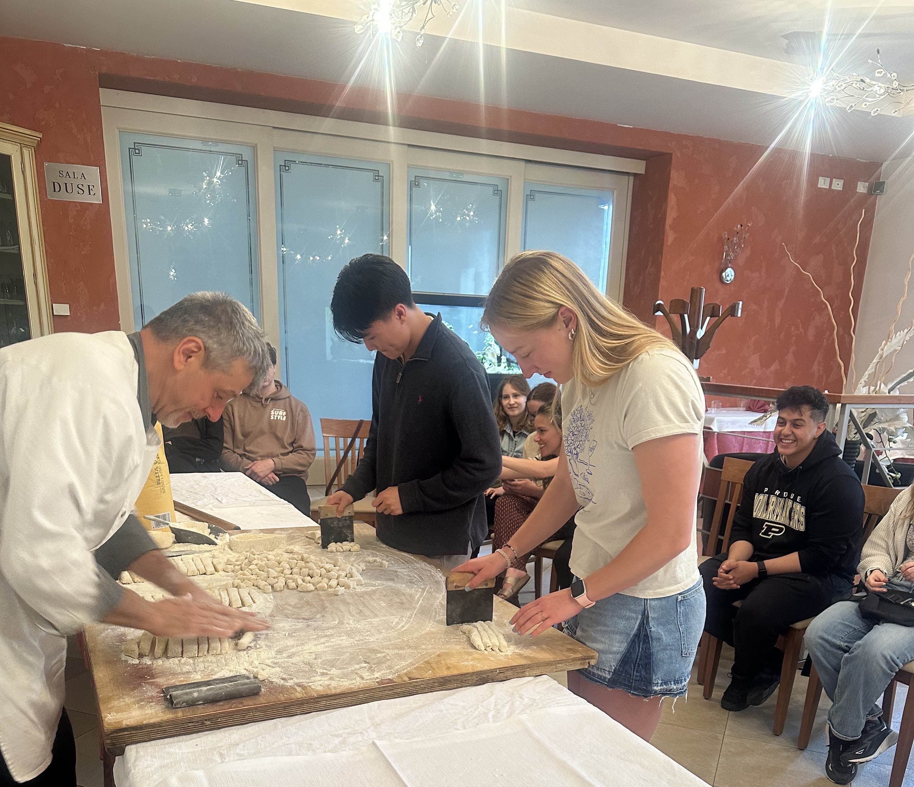 Riley and I cutting Gnocchi